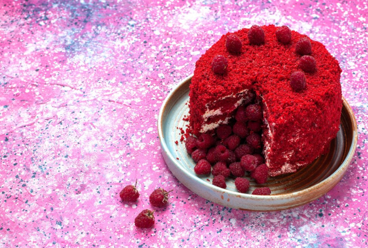 Rosewater and raspberry sponge cake topped with fresh raspberries - Pink Foods.