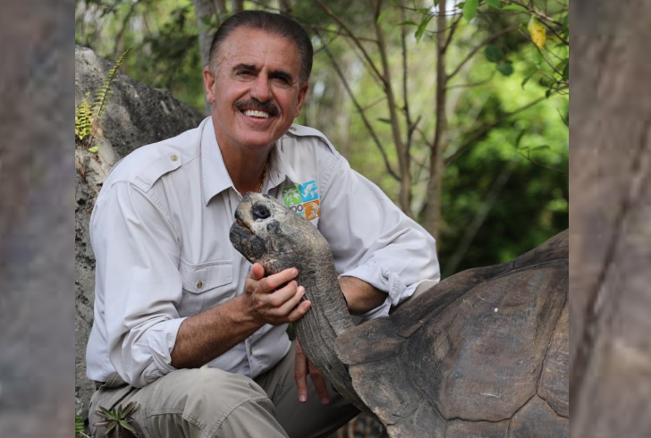 Ron Magill with a Goliath tortoise